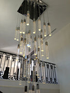Modern Crystal Stick Chandelier with Glacier Bubble Design in Gold, Chrome, and Black Finish - High-Quality