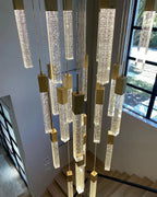 Modern Crystal Stick Chandelier with Glacier Bubble Design in Gold, Chrome, and Black Finish - High-Quality